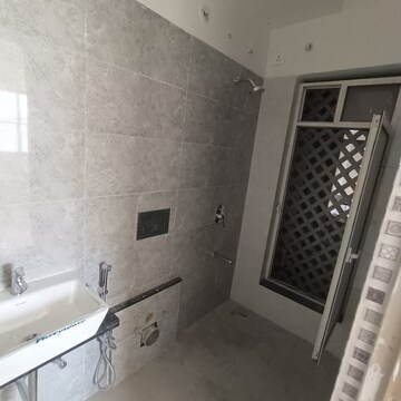 Bathroom in 1 BHK Apartment at Omkar Signet, Malad East – for Rent