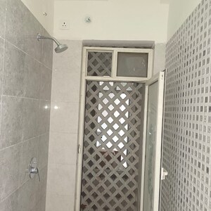 Bathroom in 1 BHK Apartment at Omkar Signet, Malad East – for Rent