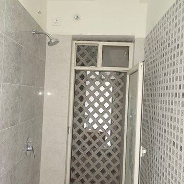 Bathroom in 1 BHK Apartment at Omkar Signet, Malad East – for Rent