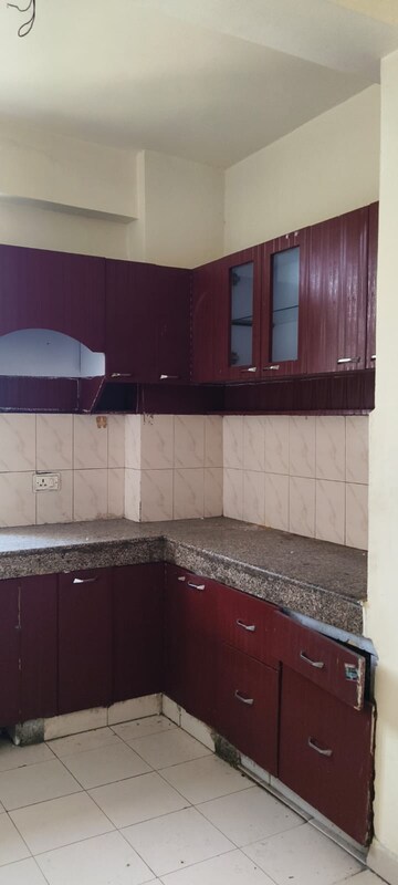 Kitchen in 2 BHK Apartment at Emenox Brave Hearts Plaza, Raj Nagar Extension – for Rent