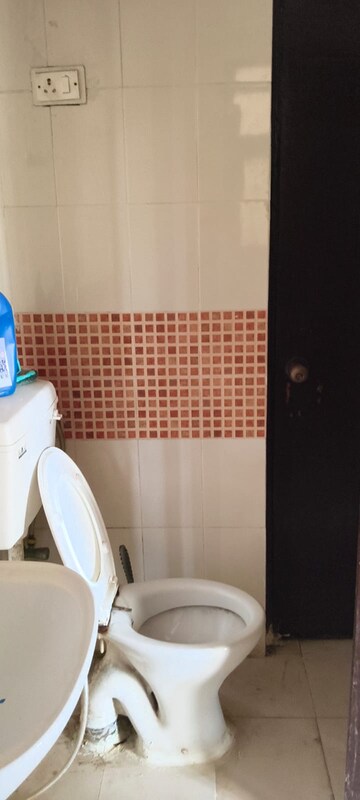 Bathroom in 2 BHK Apartment at Emenox Brave Hearts Plaza, Raj Nagar Extension – for Rent