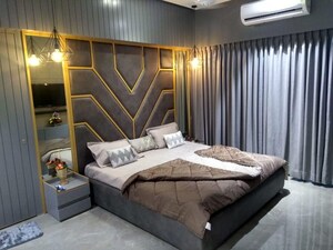 Bedroom in 4 BHK Apartment at Vesu – for Sale