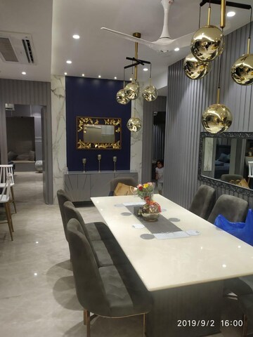 Dining area in 4 BHK Apartment at Vesu – for Sale