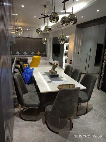 Dining area in 4 BHK Apartment at Vesu – for Sale