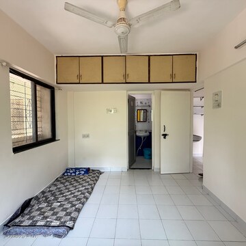 Bedroom in 2 BHK Apartment at Mangalmurti CHS, Sutarwadi – for Rent