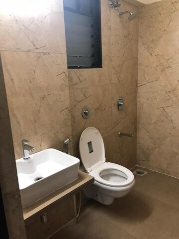 Bathroom in 2 BHK Apartment at Quality Annex, Shilphata – for Sale
