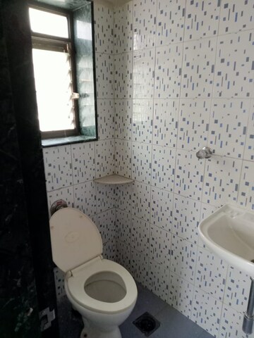 Bathroom in 2 BHK Apartment at Rameshwar CHS Santacruz, Santacruz West – for Rent