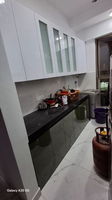 Kitchen in 1 BHK Apartment at Raymond Ten X Habitat, Pokhran Road No Two – for Rent