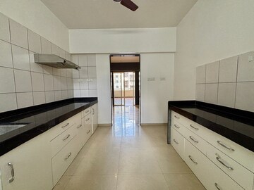 Kitchen in 3 BHK Apartment at Ambiience Greendale, Sopan Baug – for Rent