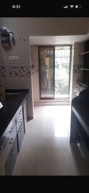 Kitchen in 2 BHK Apartment at Vasant Vihar Society, Manpada – for Rent