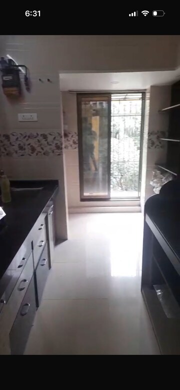 Kitchen in 2 BHK Apartment at Vasant Vihar Society, Manpada – for Rent