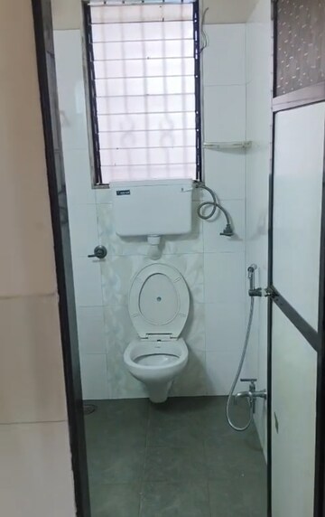 Bathroom in 2 BHK Apartment at Miraj Residency, Malad West – for Rent