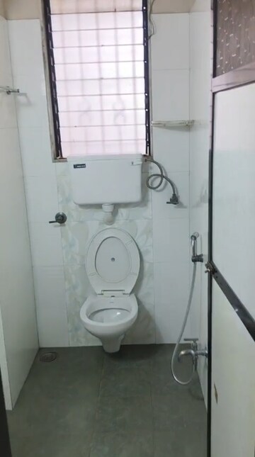 Bathroom in 2 BHK Apartment at Miraj Residency, Malad West – for Rent