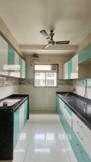 Kitchen in 2 BHK Apartment at Om Sai Chembur Nandadeep CHS, Chembur – for Rent