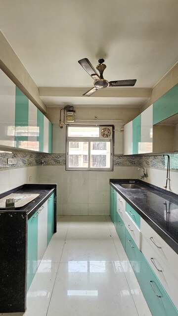 Kitchen in 2 BHK Apartment at Om Sai Chembur Nandadeep CHS, Chembur – for Rent
