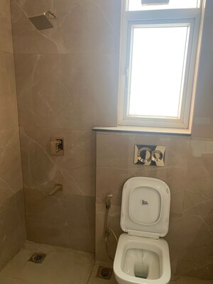 Bathroom in 3.5 BHK Builder Floor at Smart World Orchard, Sector 61 – for Rent