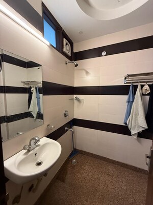 Bathroom in 2 BHK Builder Floor at Kalkaji – for Rent