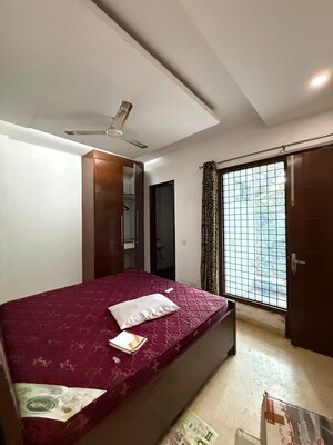 Bedroom in 2 BHK Builder Floor at Kalkaji – for Rent