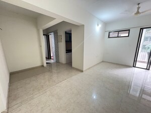 Living Room in 1.5 BHK Apartment at Lodha Palava City Lakeshore Greens, Dombivli East – for Sale