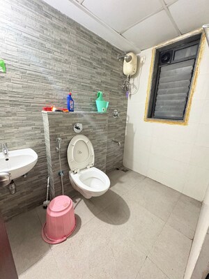 Bathroom in 1.5 BHK Apartment at Lodha Palava City Lakeshore Greens, Dombivli East – for Sale