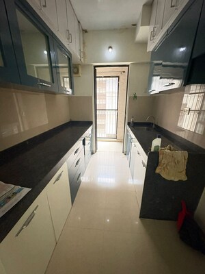 Kitchen in 1.5 BHK Apartment at Lodha Palava City Lakeshore Greens, Dombivli East – for Sale