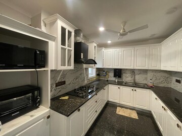 Kitchen in 4 BHK Builder Floor at New Friends Colony – for Rent