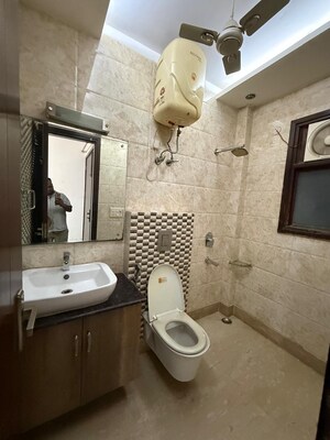 Bathroom in 3 BHK Builder Floor at Kalkaji – for Rent