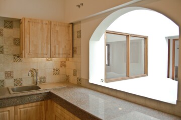 Kitchen in 4 BHK Apartment at Jor Bagh – for Rent