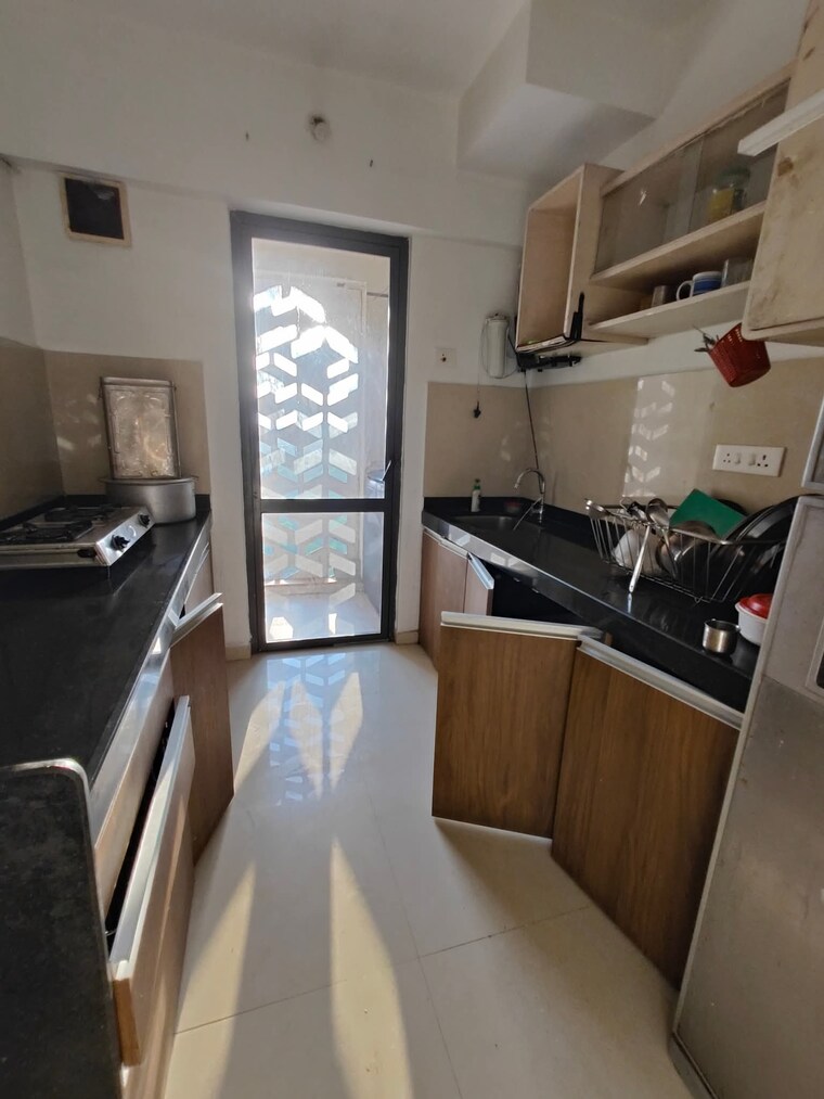 Kitchen, lodha-palava-city-lakeshore-greens 2.5 Bedroom 834 Sq.Ft. Apartment In Dombivli East Thane 9387156