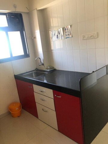 Kitchen in 1 BHK Apartment at Puranik Hometown, Ghodbunder Road – for Rent