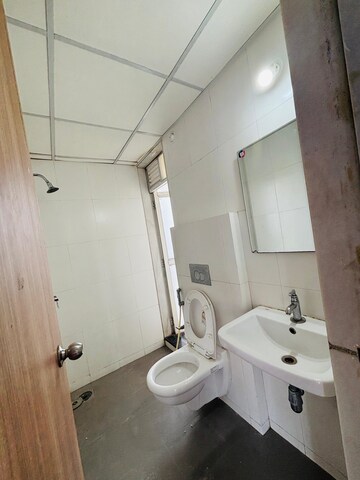 Bathroom in 1 BHK Apartment at Raunak Heights, Ghodbunder Road – for Rent