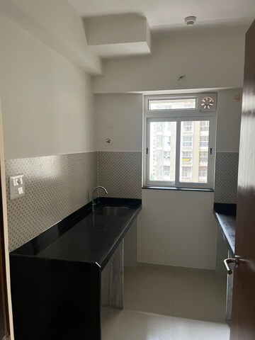 Kitchen in 1 BHK Apartment at Raunak Heights, Ghodbunder Road – for Rent