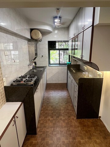 Kitchen in 3 BHK Apartment at Best Rajdoot CHS Andheri, Andheri West – for Sale