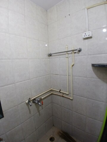 Bathroom in 1 BHK Apartment at Nisarg CHSL, Goregaon East – for Rent
