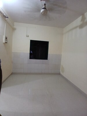 Bathroom in 1 BHK Apartment at Nisarg CHSL, Goregaon East – for Rent