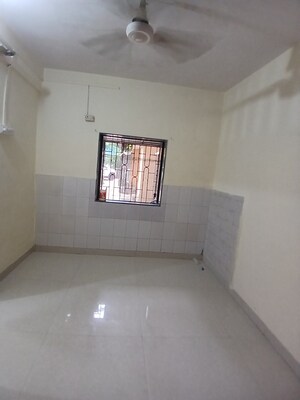 Room in 1 BHK Apartment at Nisarg CHSL, Goregaon East – for Rent