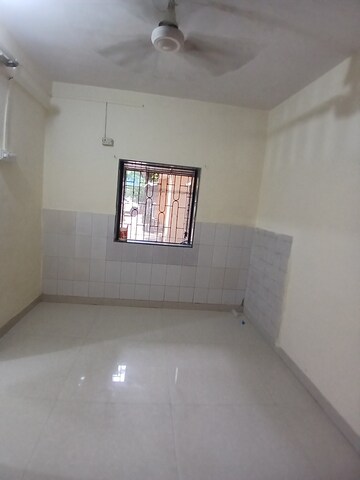 Room in 1 BHK Apartment at Nisarg CHSL, Goregaon East – for Rent