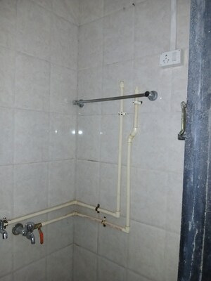 Bathroom in 1 BHK Apartment at Nisarg CHSL, Goregaon East – for Rent