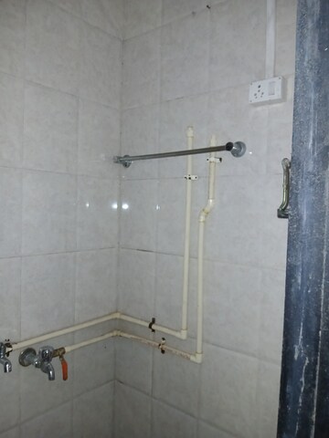 Bathroom in 1 BHK Apartment at Nisarg CHSL, Goregaon East – for Rent