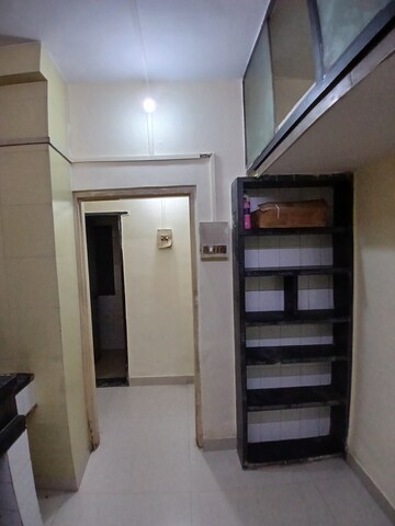 Kitchen in 1 BHK Apartment at Nisarg CHSL, Goregaon East – for Rent