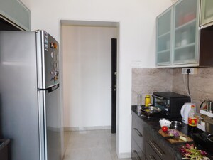Kitchen in 4 BHK Apartment at Harmony Sky Suites, Ghodbunder Road – for Rent