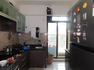 Kitchen in 4 BHK Apartment at Harmony Sky Suites, Ghodbunder Road – for Rent