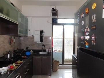 Kitchen in 4 BHK Apartment at Harmony Sky Suites, Ghodbunder Road – for Rent