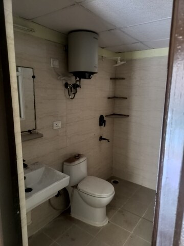 Bathroom in 2 BHK Apartment at Sethi Max Royal, Sector 76 – for Rent