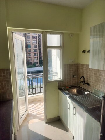 Kitchen in 2 BHK Apartment at Sethi Max Royal, Sector 76 – for Rent