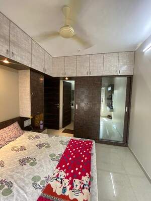 Bedroom in 2 BHK Apartment at Rustomjee Meridian, Kandivali West – for Rent