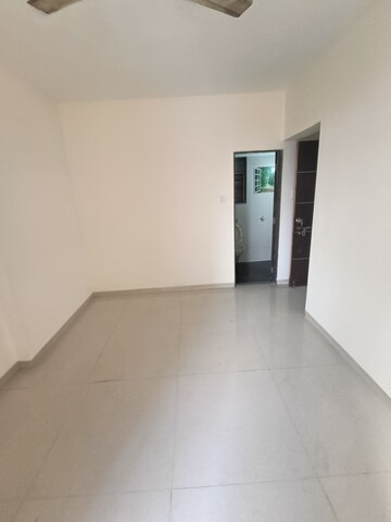 Room in 2 BHK Apartment at Rustomjee Meridian, Kandivali West – for Rent