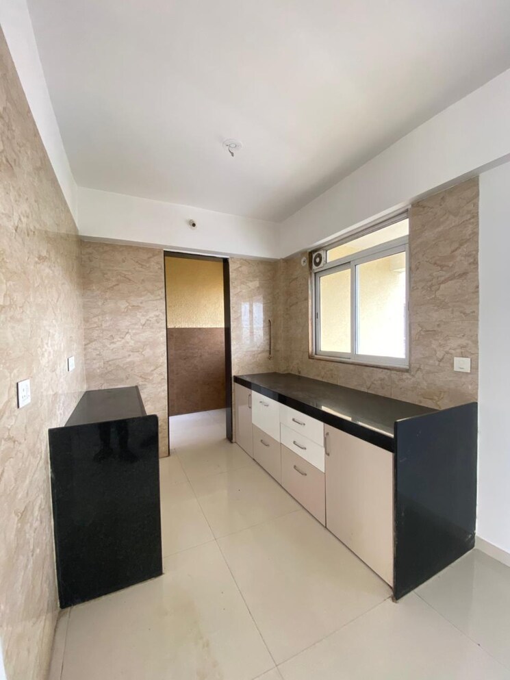 Kitchen, benchmark-cyprus 2 Bedroom 875 Sq.Ft. Apartment In Punawale Pune 9387638