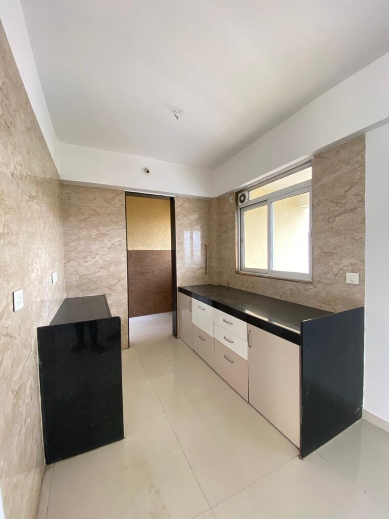 Kitchen, benchmark-cyprus 2 Bedroom 875 Sq.Ft. Apartment In Punawale Pune 9387638