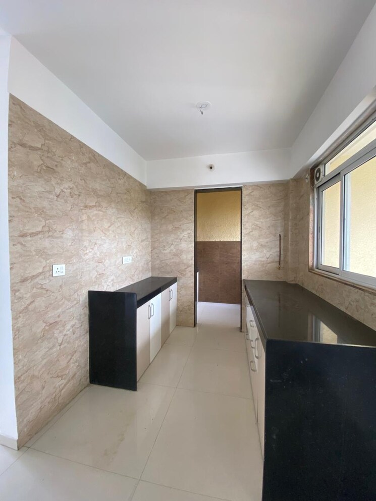 Kitchen, benchmark-cyprus 2 Bedroom 875 Sq.Ft. Apartment In Punawale Pune 9387638